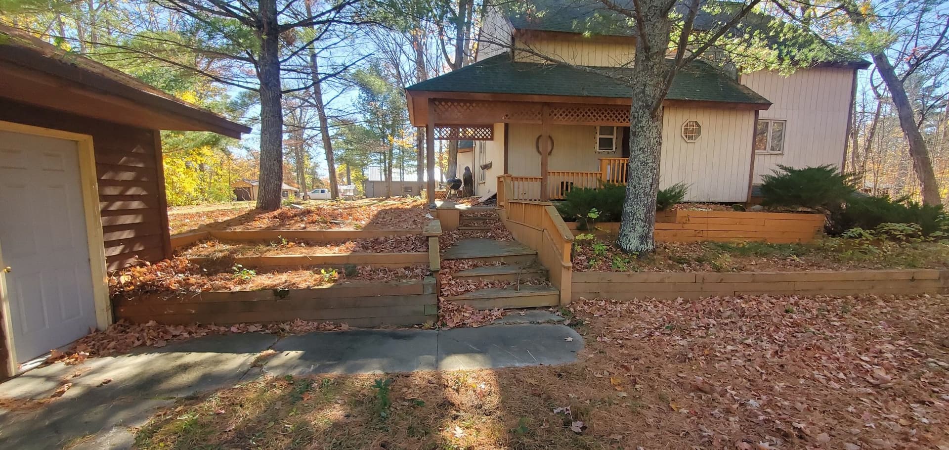 Northern MN Cabin Gets New Stone Steps and Boulder Retaining Walls image