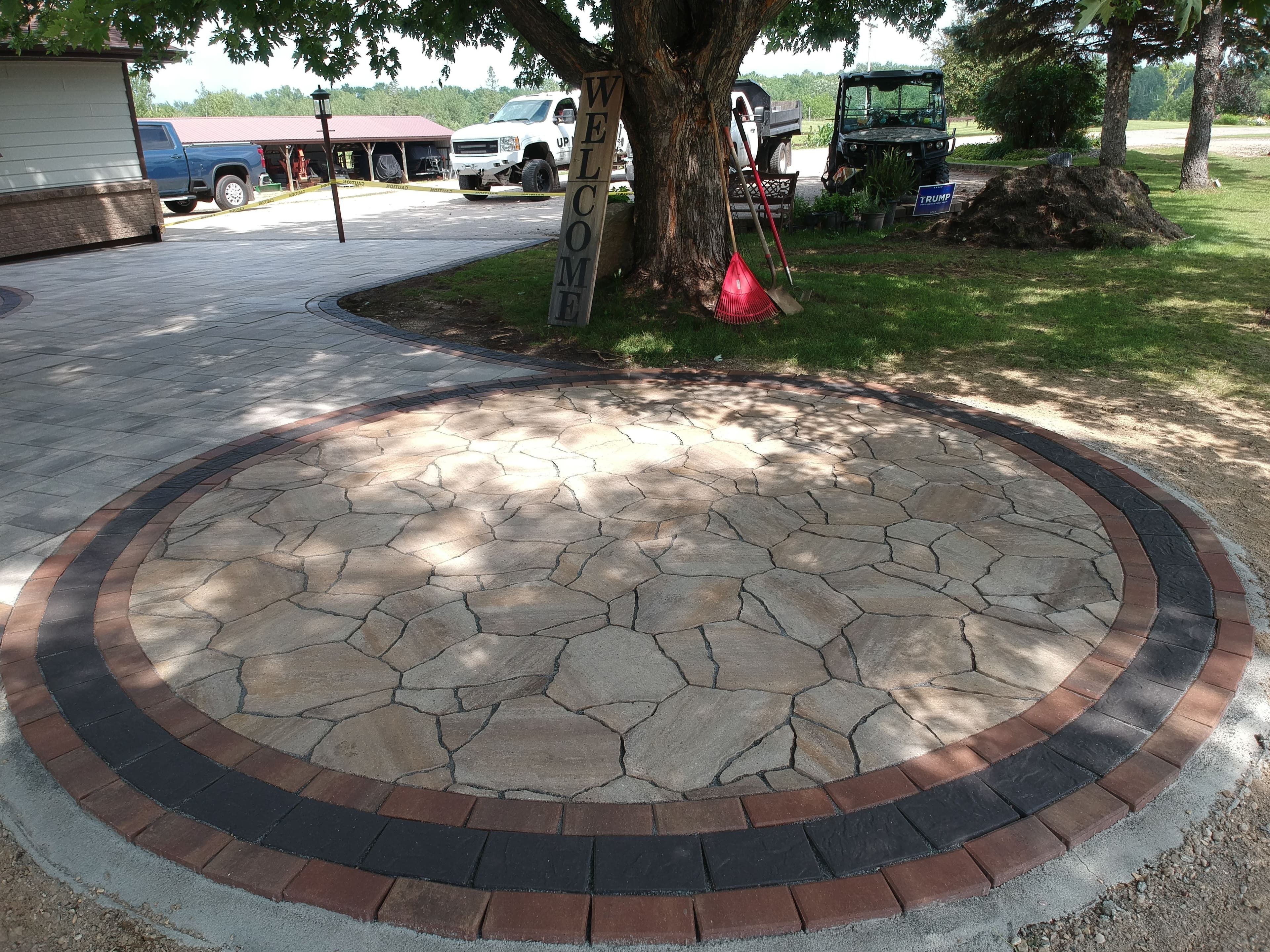 Project Elegant Stone Patios and Pathways Enhance Outdoor Living image