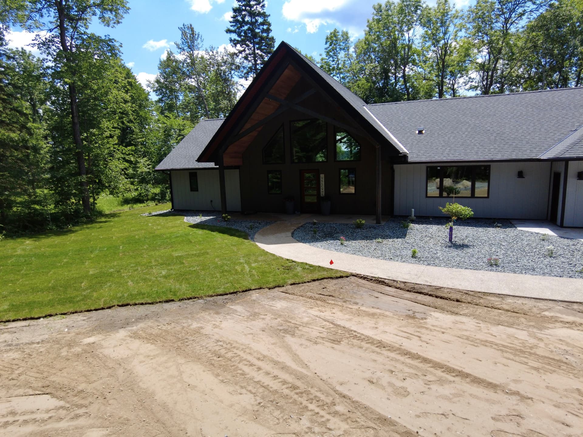 New Construction Landscaping Done Right - Sod, Rock Beds, and Full Irrigation image