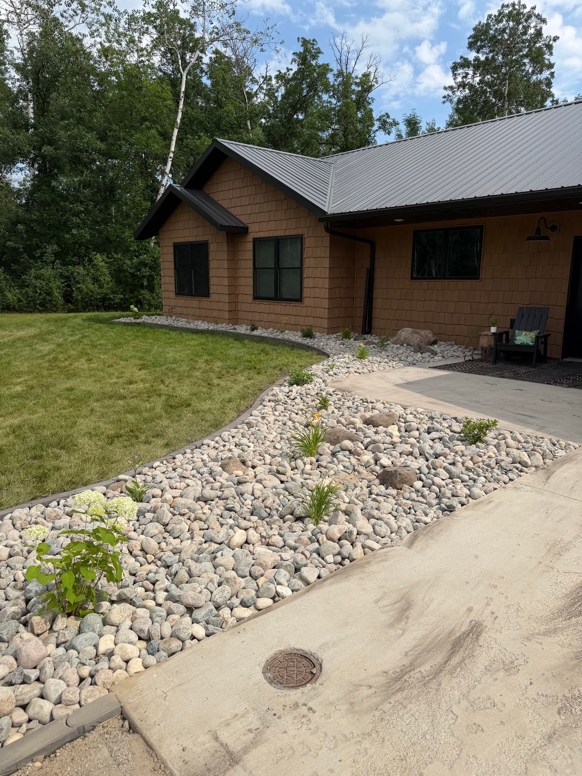 Gallery photos for Rock Edging and River Rock Beds That Actually Hold Their Shape: Image #1